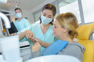 a patient getting fluoride treatment in tx