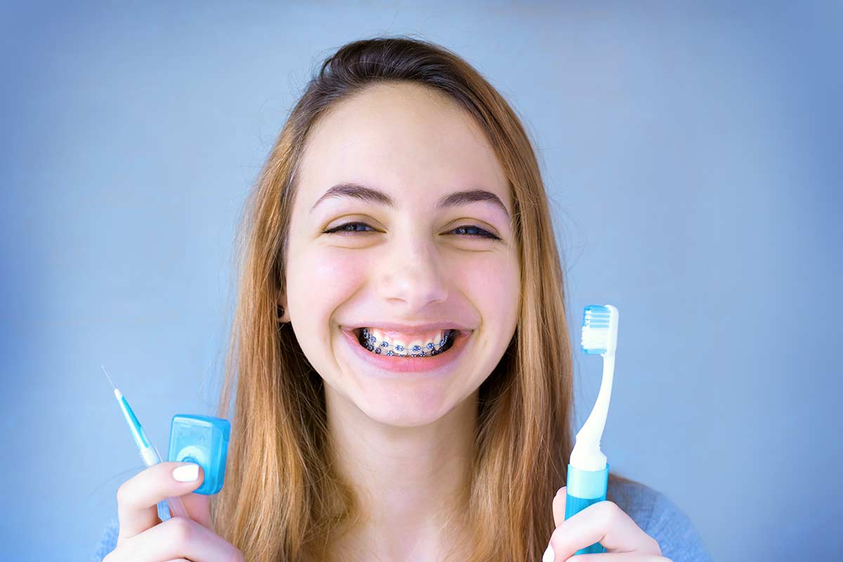 cleaning-your-teeth-with-braces-tx-orthodontic-services