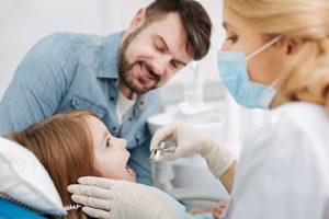 a young child visits her family dentistry office