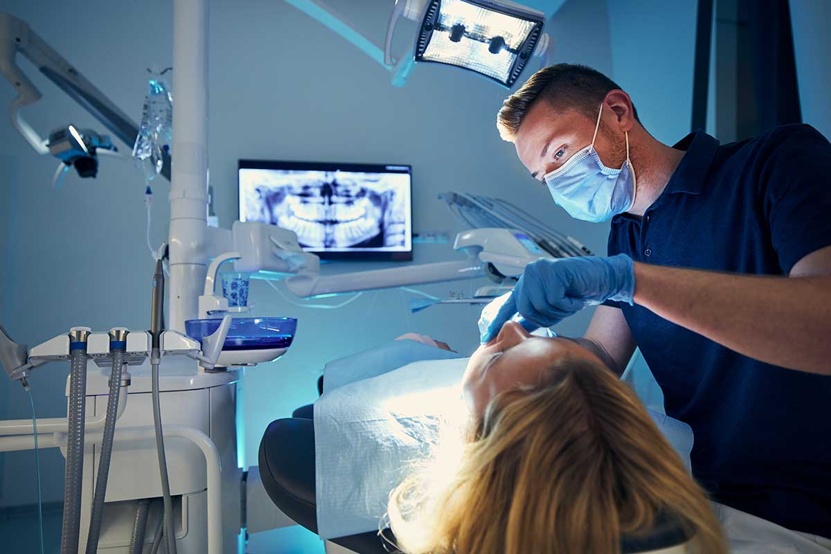 4 Common Types of Oral Surgeries (1) woman gets oral surgery